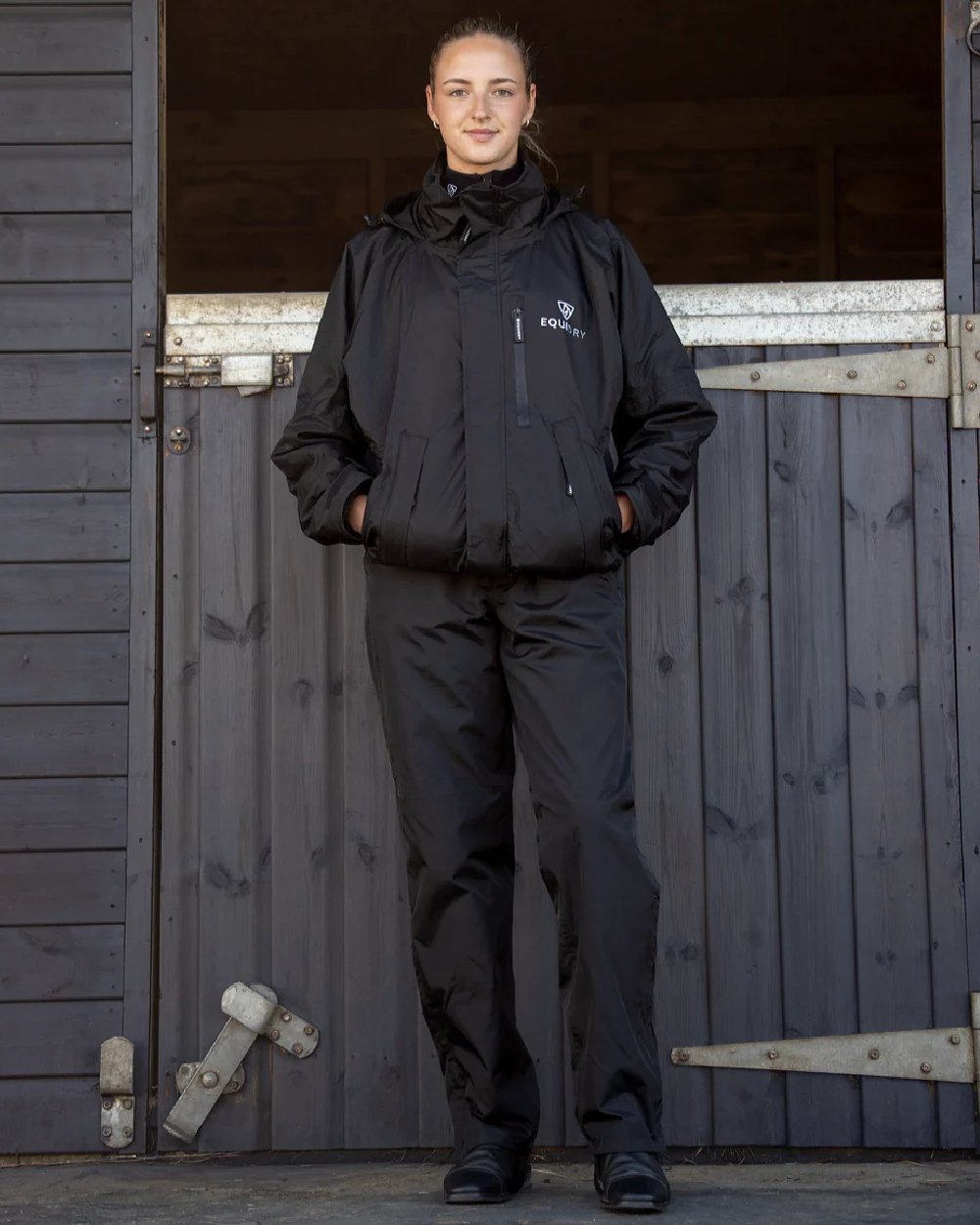 Black Coloured Equidry Womens Waterproof Fleece Lined Trousers on outdoor background