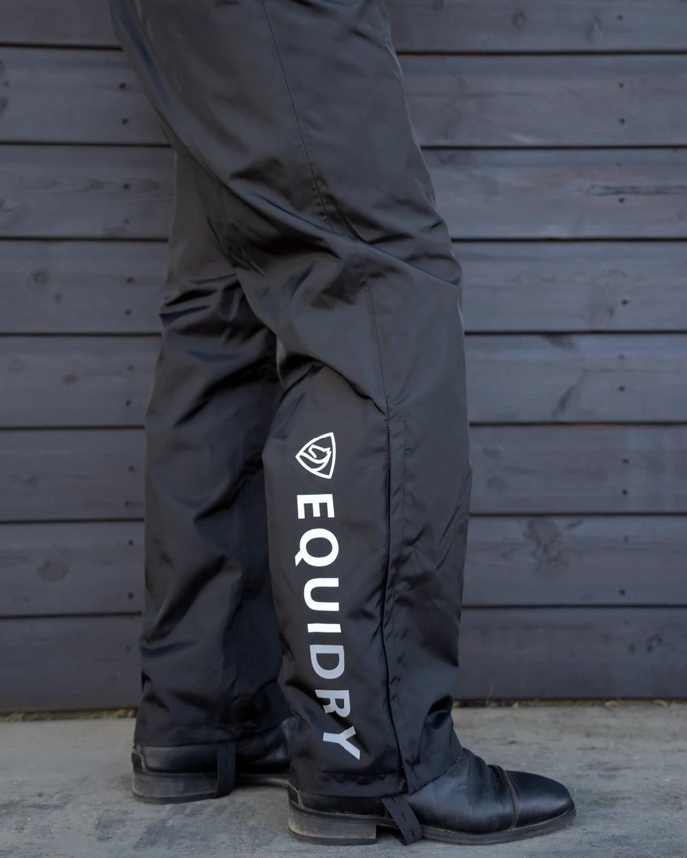 Black Coloured Equidry Womens Waterproof Fleece Lined Trousers on outdoor background