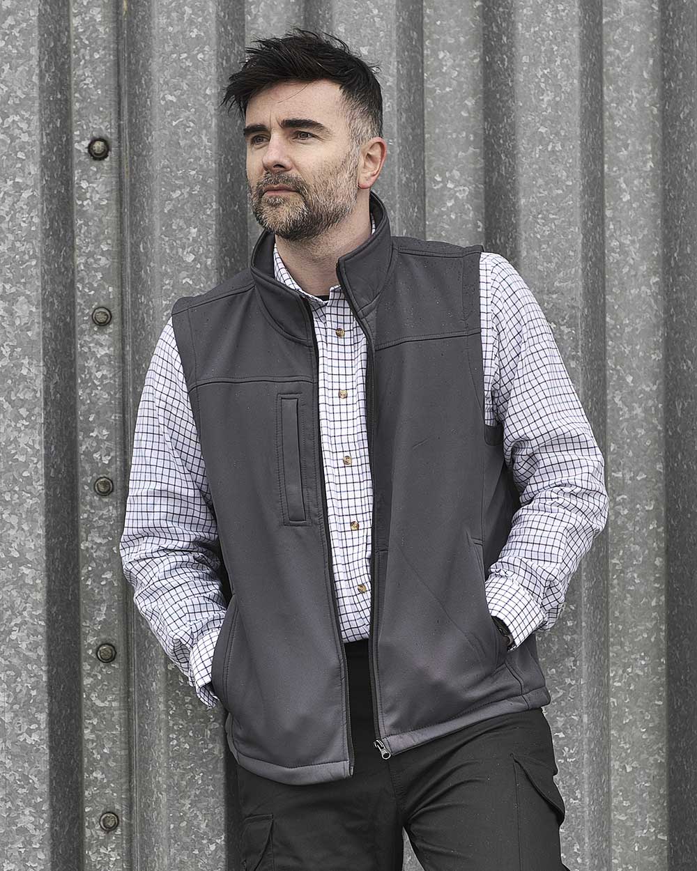 Grey coloured Fort Breckland Softshell Bodywarmer on grey background