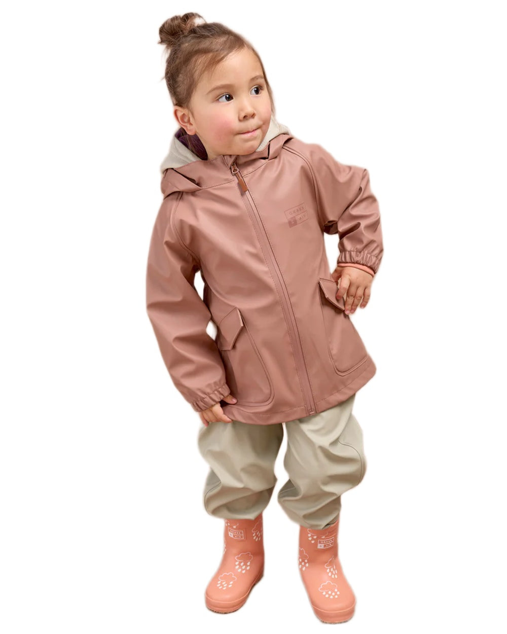 Rose coloured Grass & Air Childrens Rainster Jacket on white background