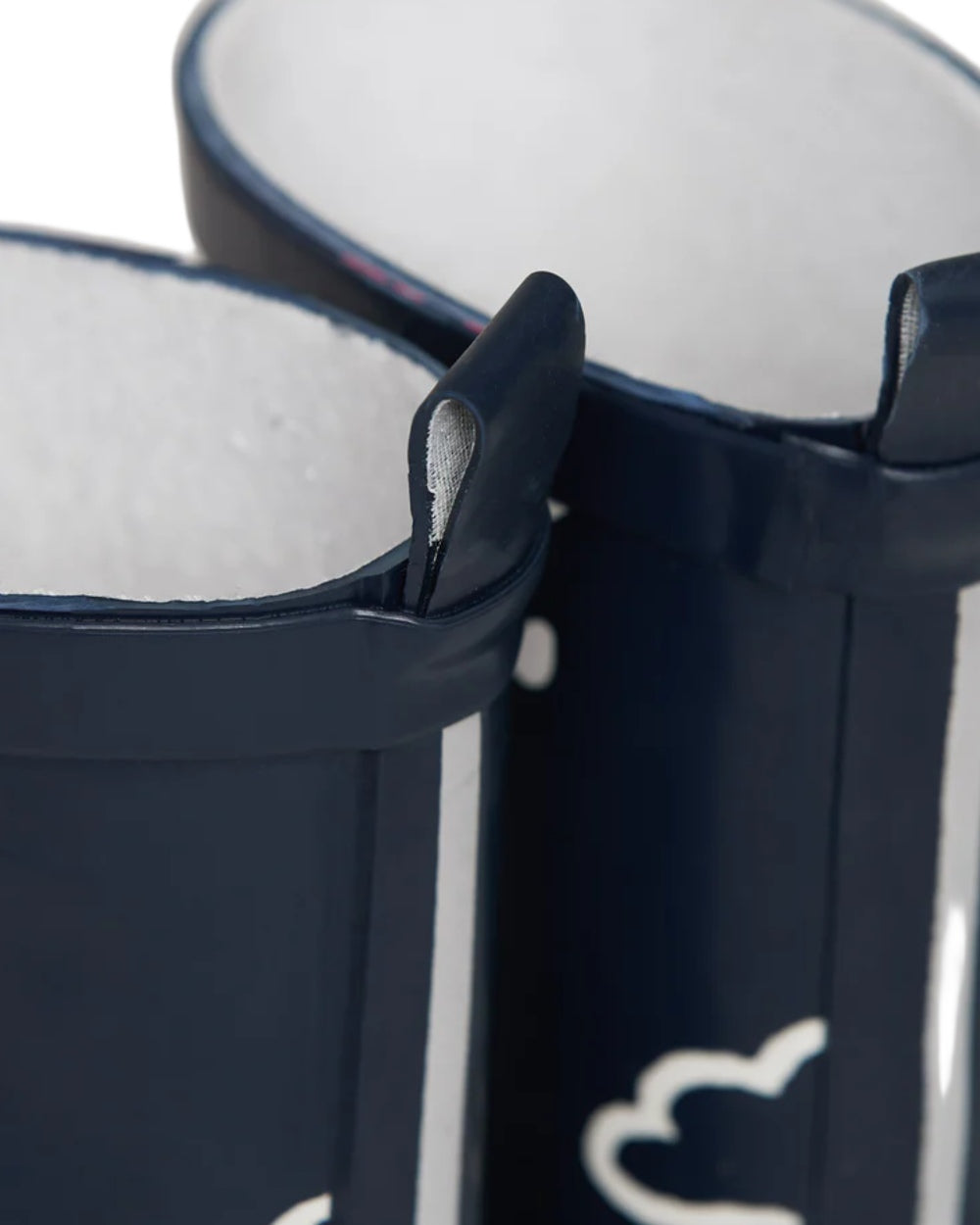 Navy coloured Grass & Air Childrens Colour-Revealing Wellies on white table background