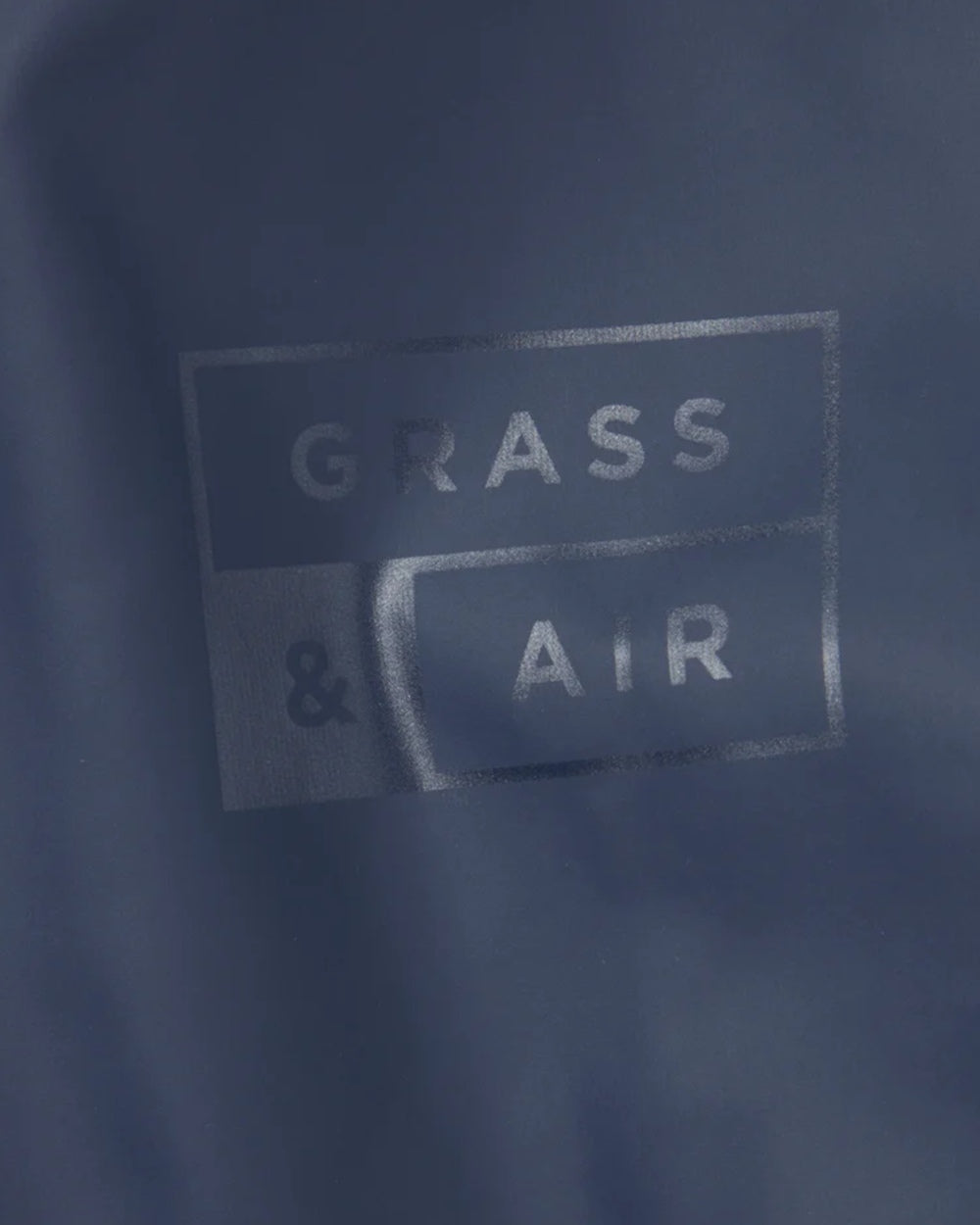 Navy coloured Grass & Air Childrens Puddle Suit on white background