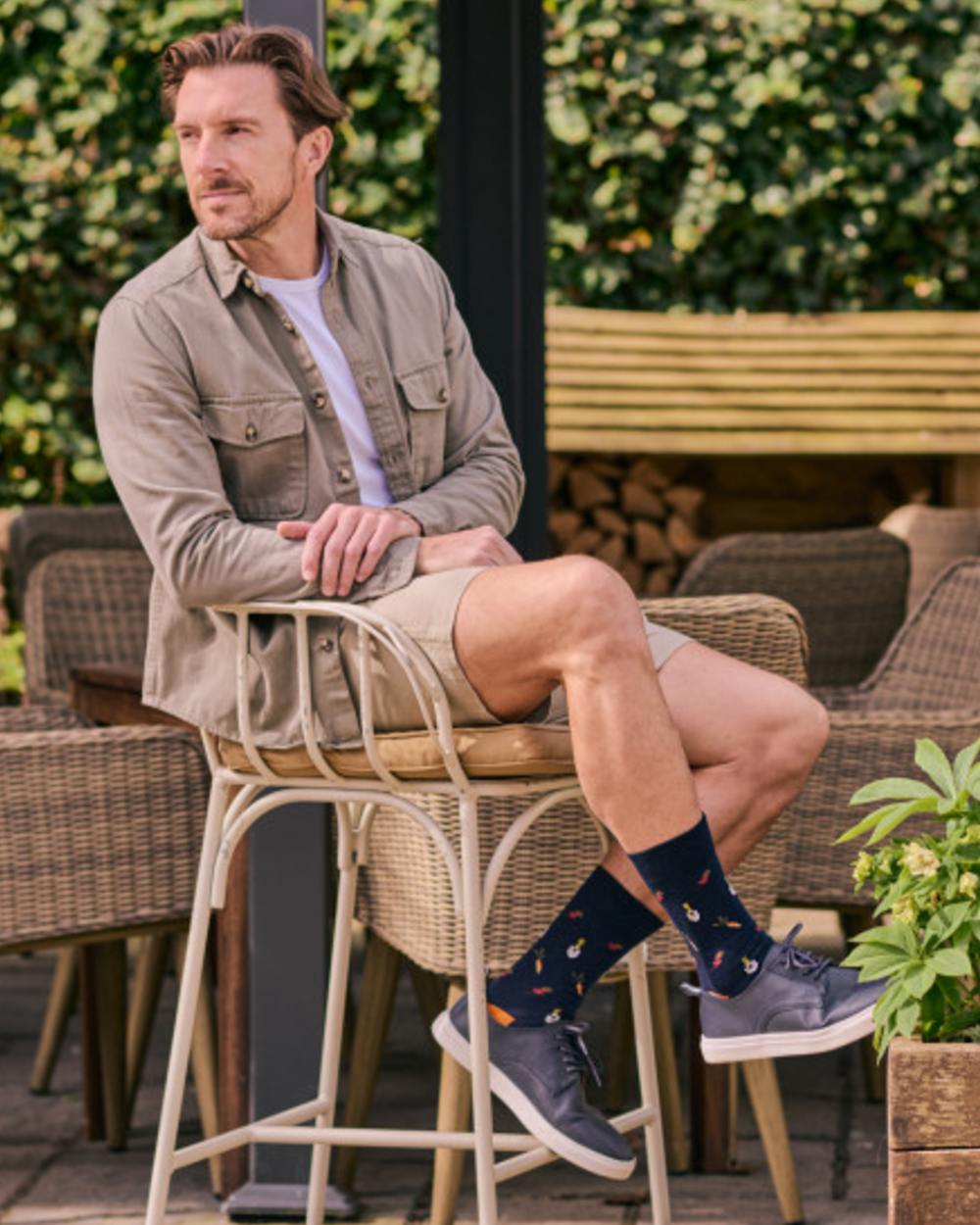 Navy Mix coloured HJ Hall Mens Garden Vegetables Motif Cotton Rich Socks 3 Pair Pack on outdoor background