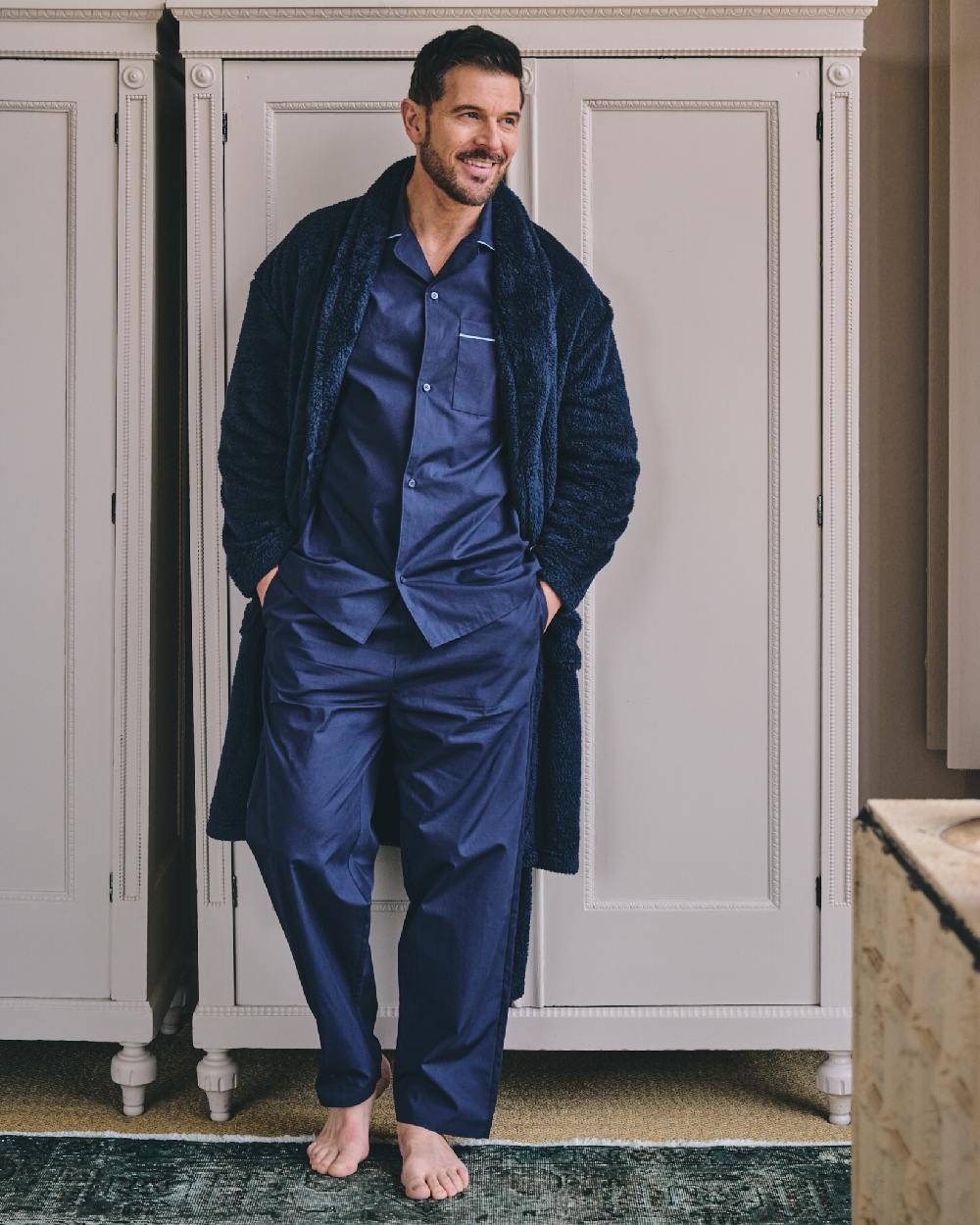 Dark Blue Coloured HJ Hall Mens Pure Cotton Pyjamas on indoor background