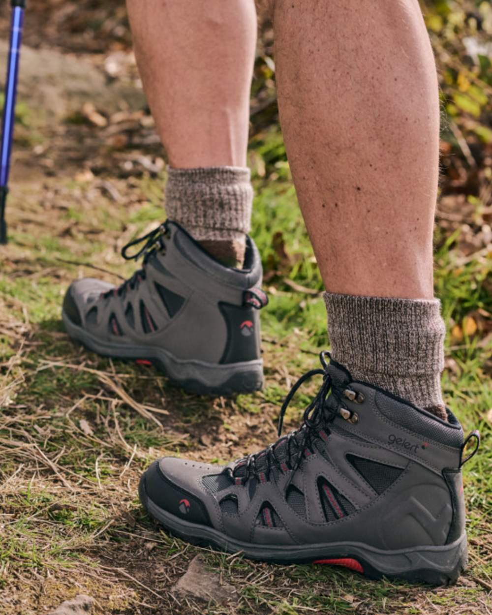Brown coloured HJ Hall Technical Rambler Anti-Blister Dual Layer Wool Socks on forest background
