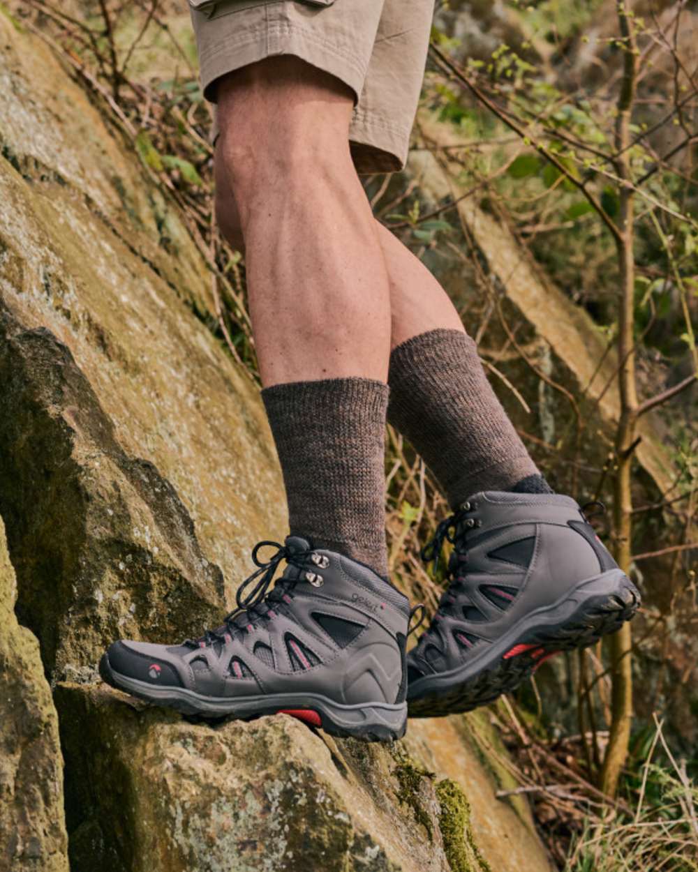 Brown coloured HJ Hall Technical Rambler Comfort Top Thermal Wool Socks on mountain background