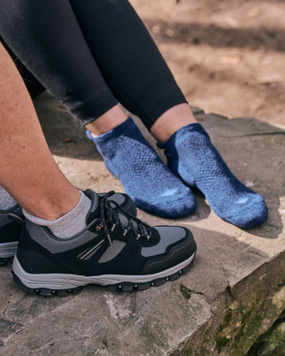 Navy coloured HJ Hall Technical Rambler Light Comfort Coolmax Fibre Cotton Trainer Socks on forest background