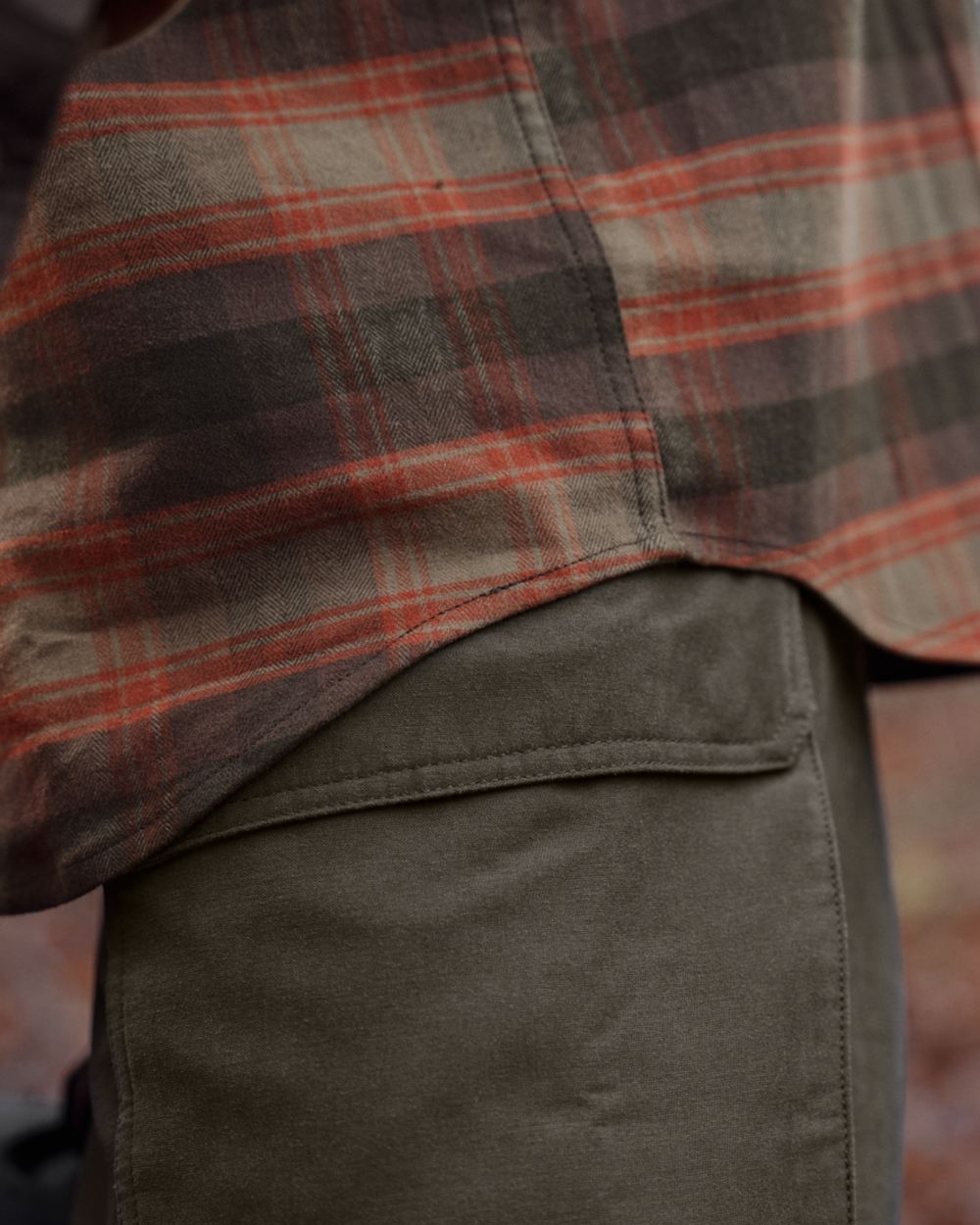 Autumn Orange Check coloured Harkila Aivak Long Sleeved Shirt on forest background