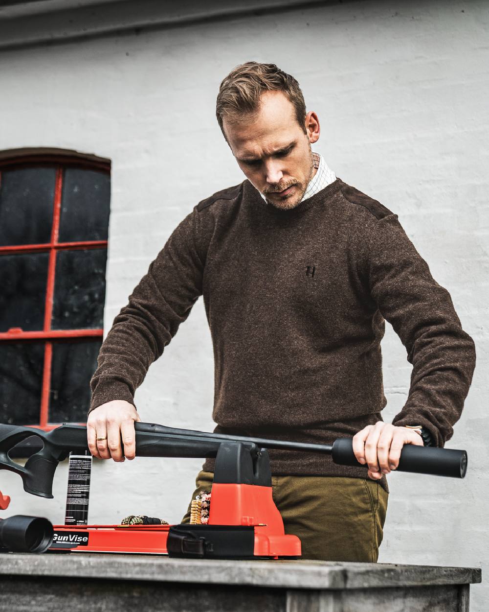 Slate Brown Coloured Harkila Arran Pullover on outdoor background