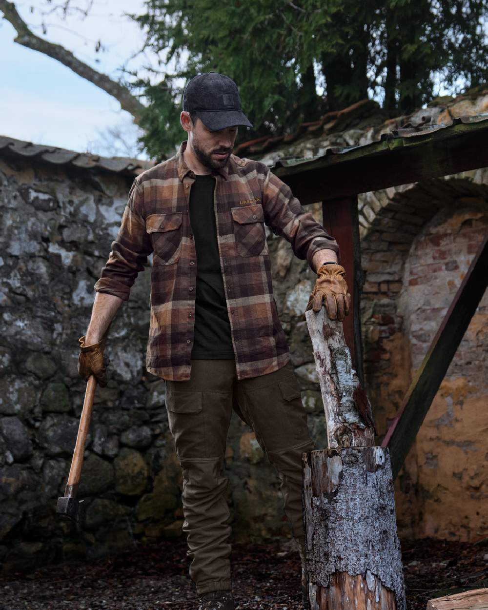 Rust Brown Check coloured Harkila Asmund Long Sleeve Shirt on yard background