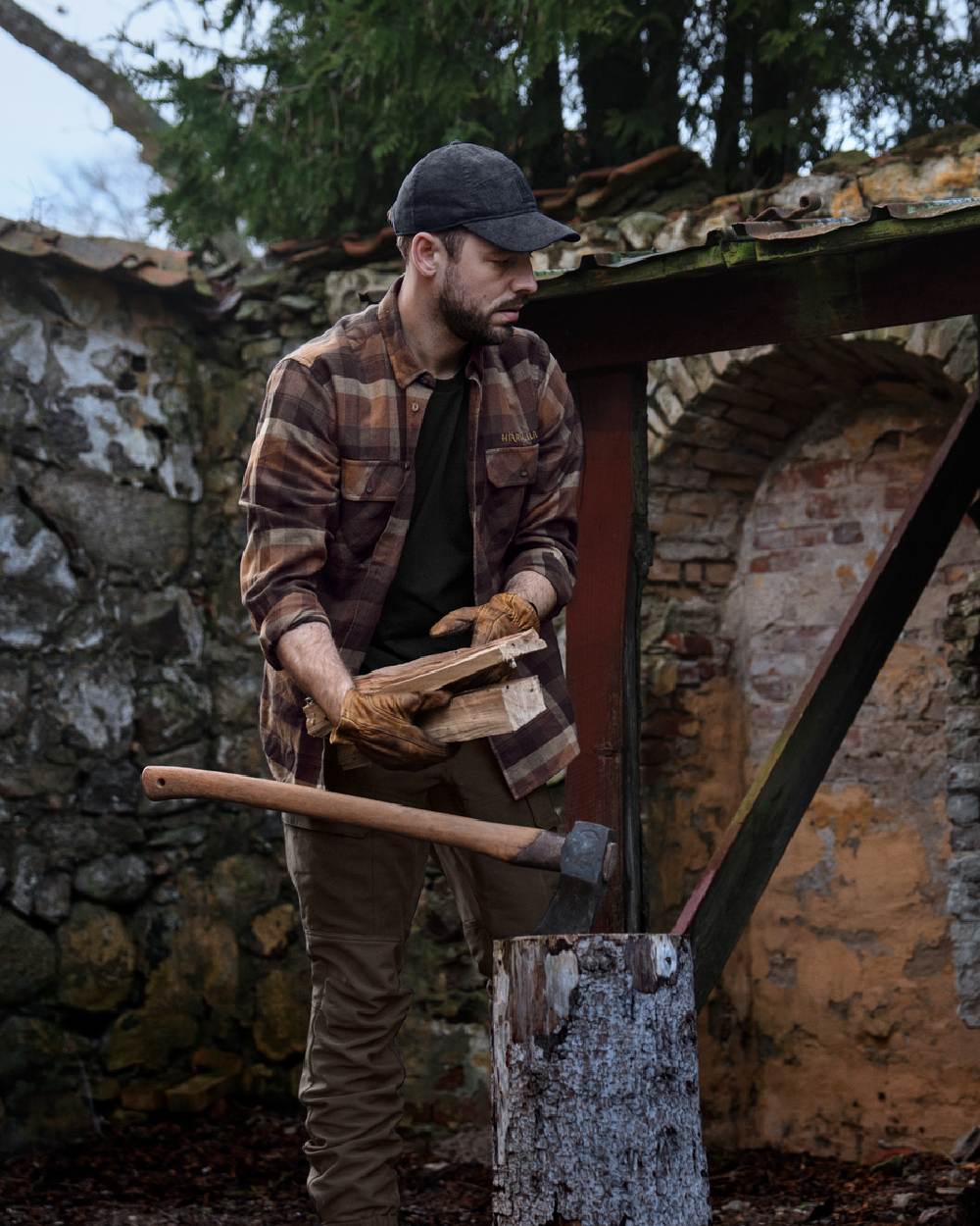 Rust Brown Check coloured Harkila Asmund Long Sleeve Shirt on yard background