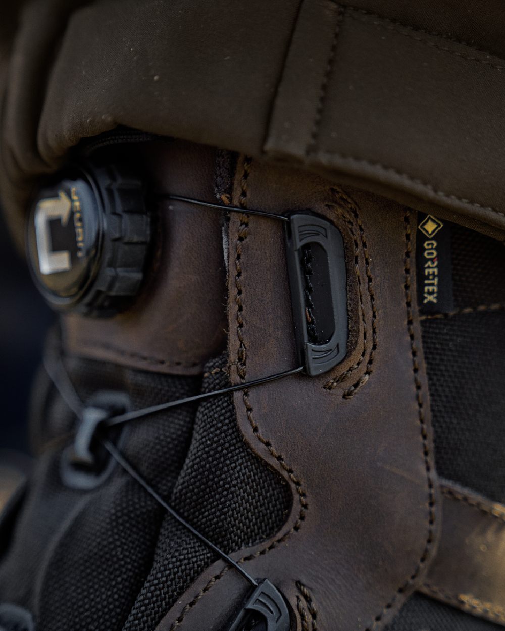 Dark Brown Coloured Harkila Atammik GTX Waterproof Boots on outdoor background