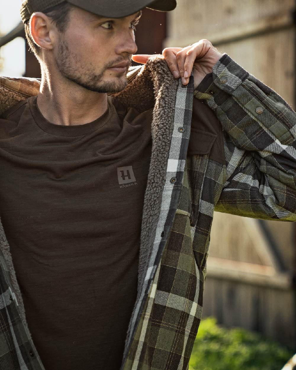 Shadow Brown Coloured Harkila Base All Season Short Sleeve T-Shirt on outdoor background