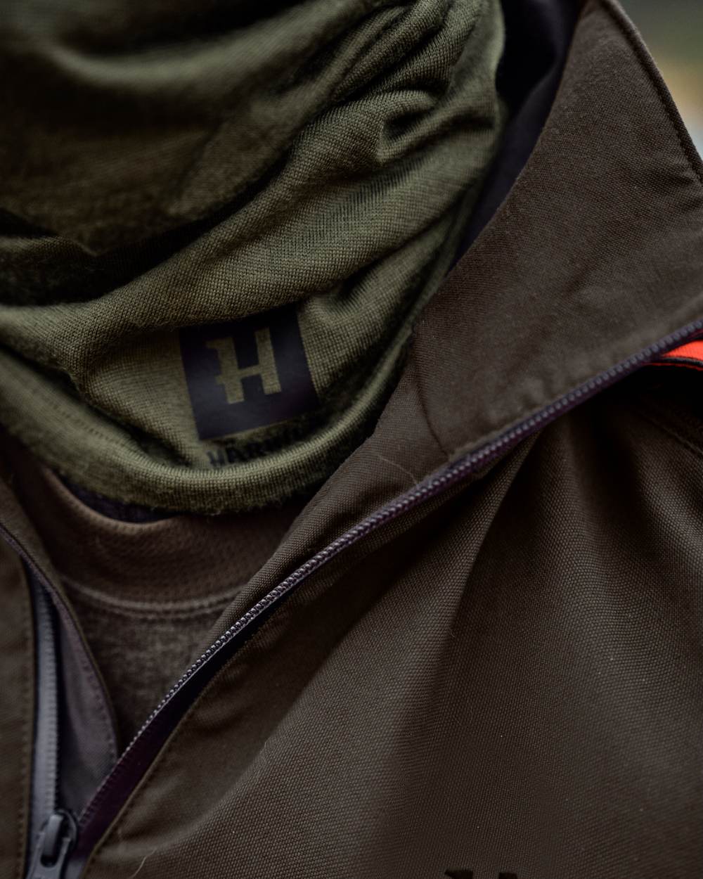 Dark Olive Coloured Harkila Base All Season Tubular Limited Edition on outdoor background