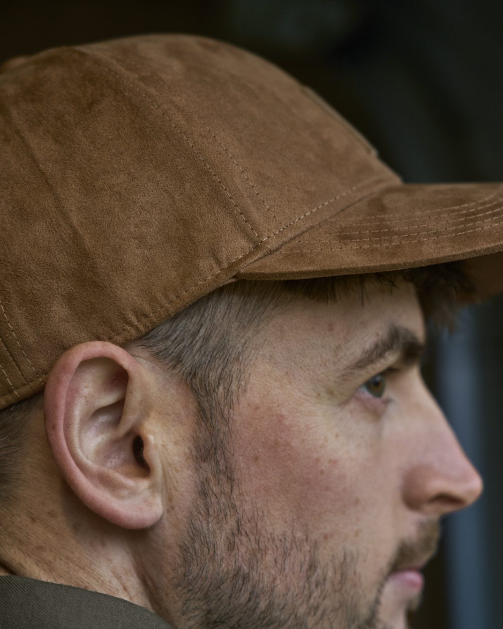 Antique Bronze Coloured Harkila Berkshire Cap on outdoor background