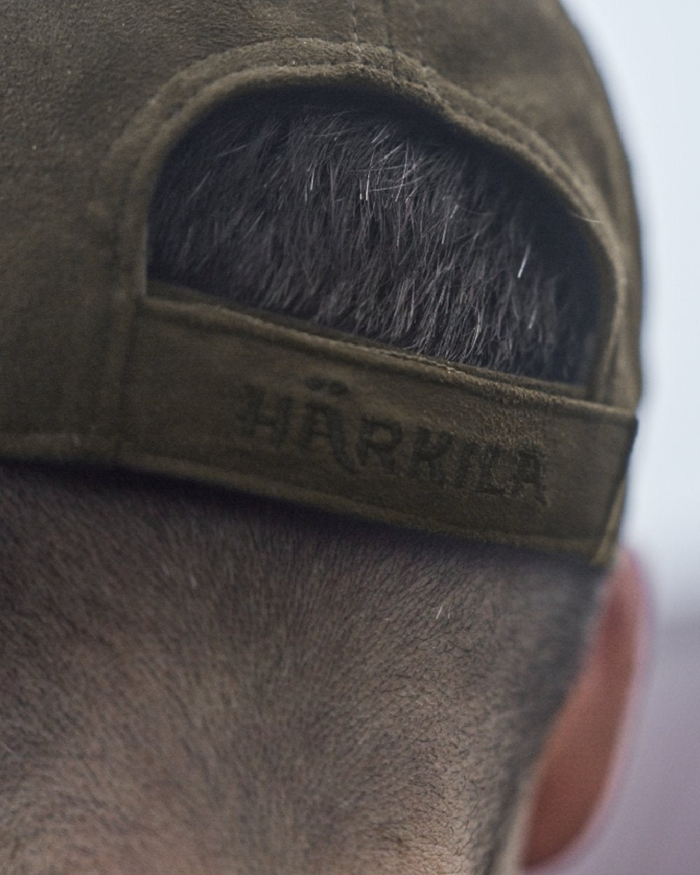 Hunting Green Coloured Harkila Berkshire Cap on outdoor background