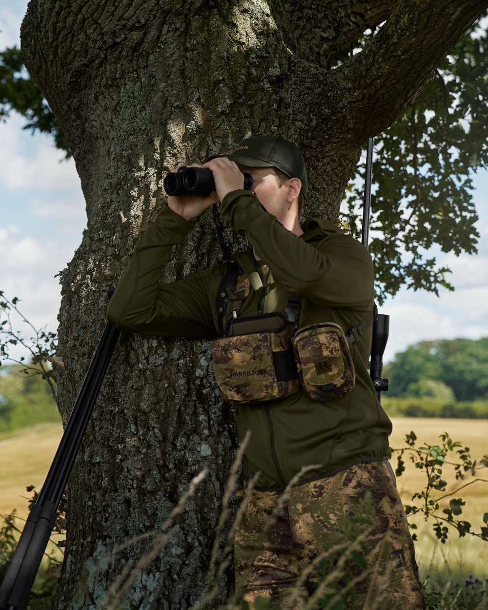 AXIS MSP Forest Coloured Harkila Bino Harness on outdoor background