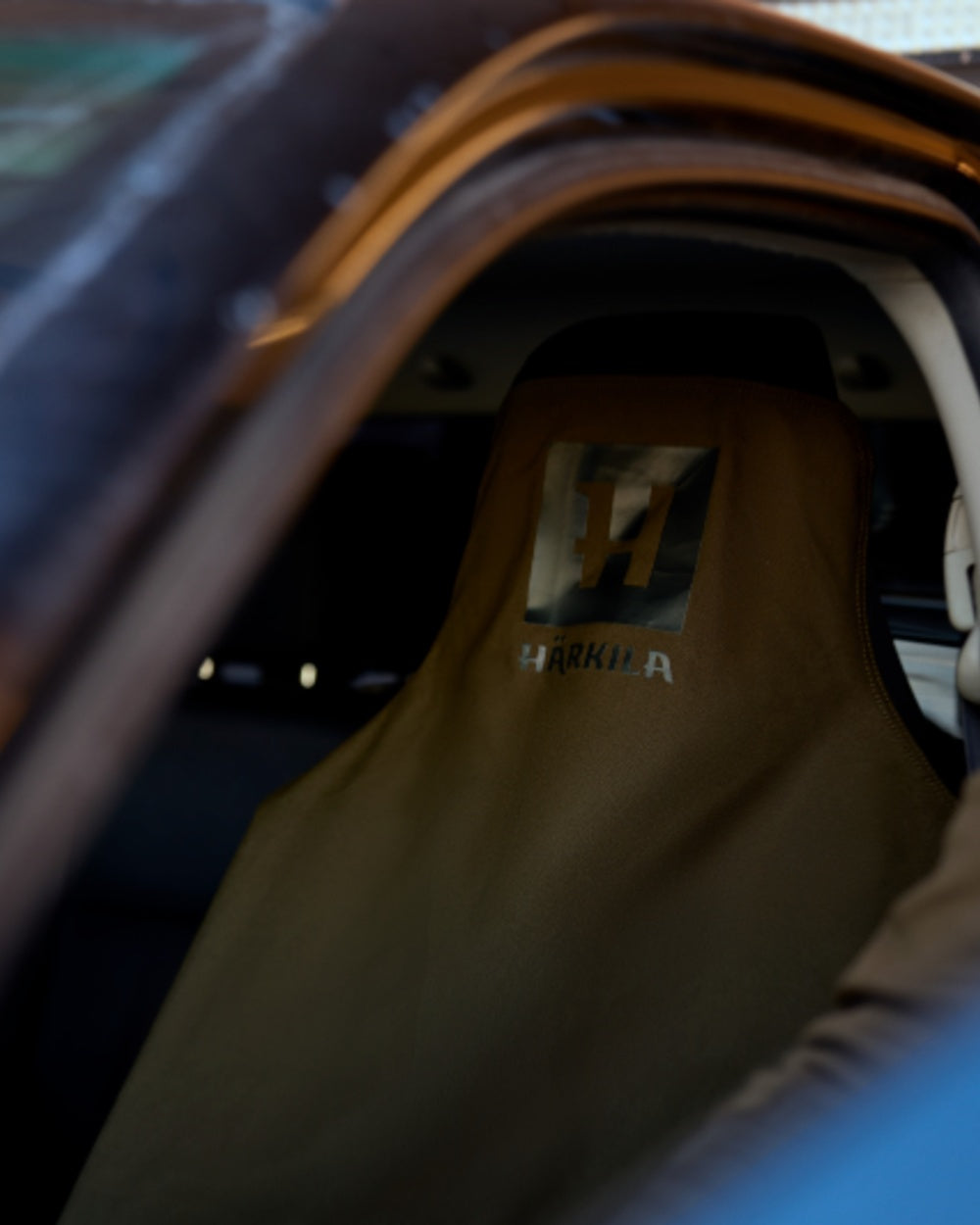 Hunting Green Coloured Harkila Car Seat Cover on car background