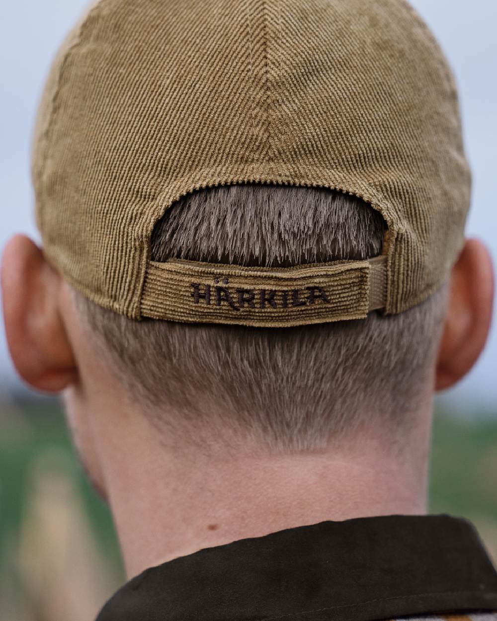 Elmwood coloured Harkila Corduroy Cap on outdoor background