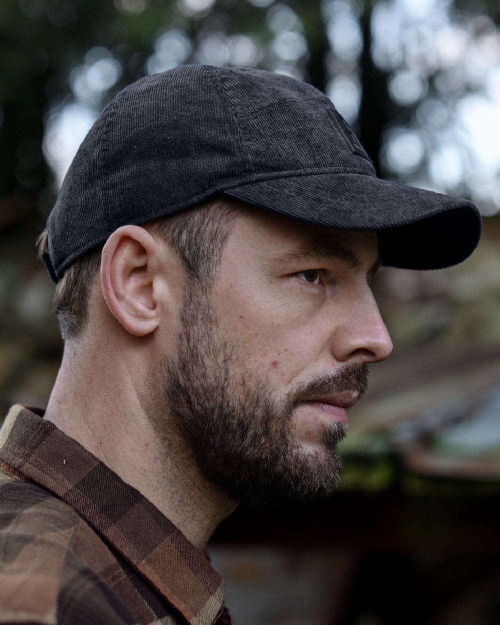 Phantomcoloured Harkila Corduroy Cap on outdoor background.