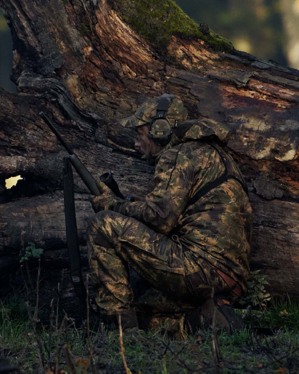 AXIS Forest Coloured Harkila Deer Stalker Camo HWS Jacket on forest background