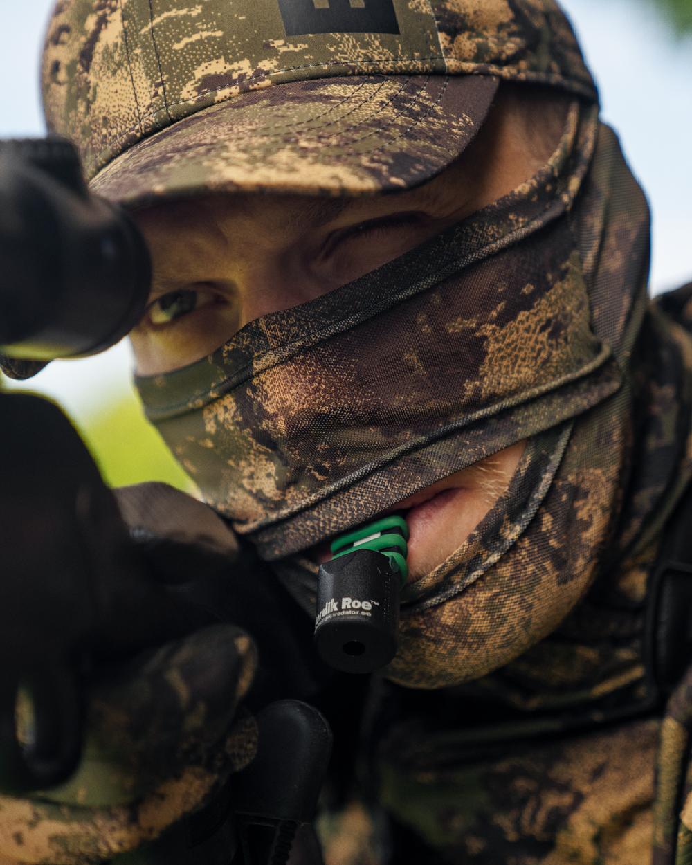 AXIS Forest Coloured Harkila Deer Stalker Camo Mesh Face Cover on blurry background