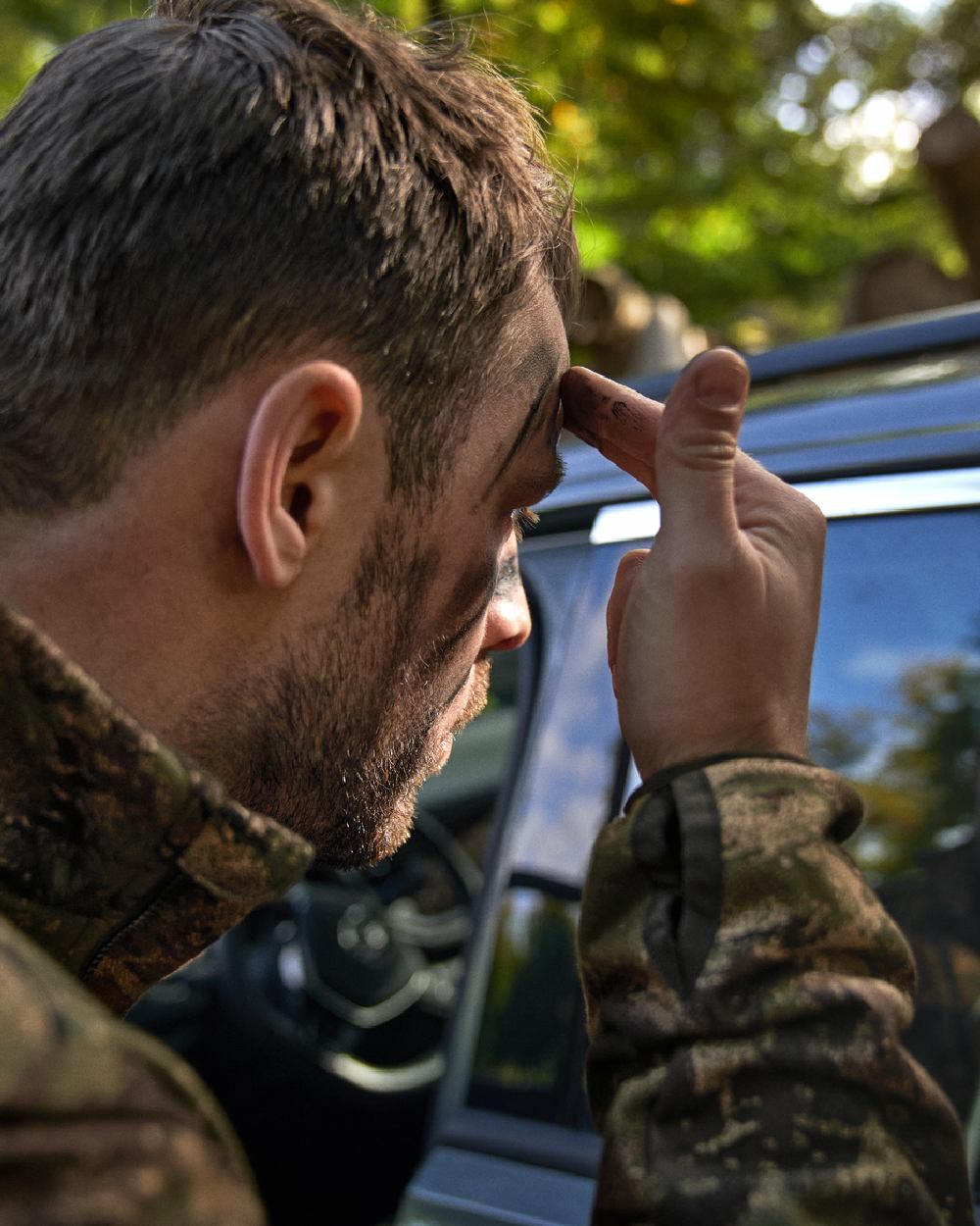 AXIS Forest Coloured Harkila Deer Stalker Camo WSP Fleece Jacket on blurry background