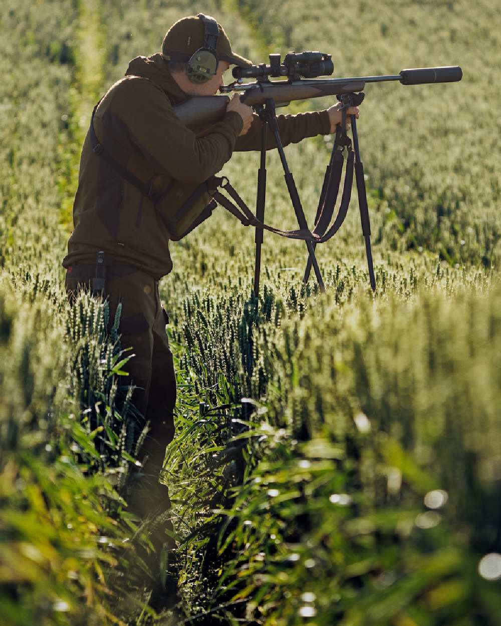 Willow Green Shadow Brown Coloured Harkila Deer Stalker Fleece Hoodie on outdoor background