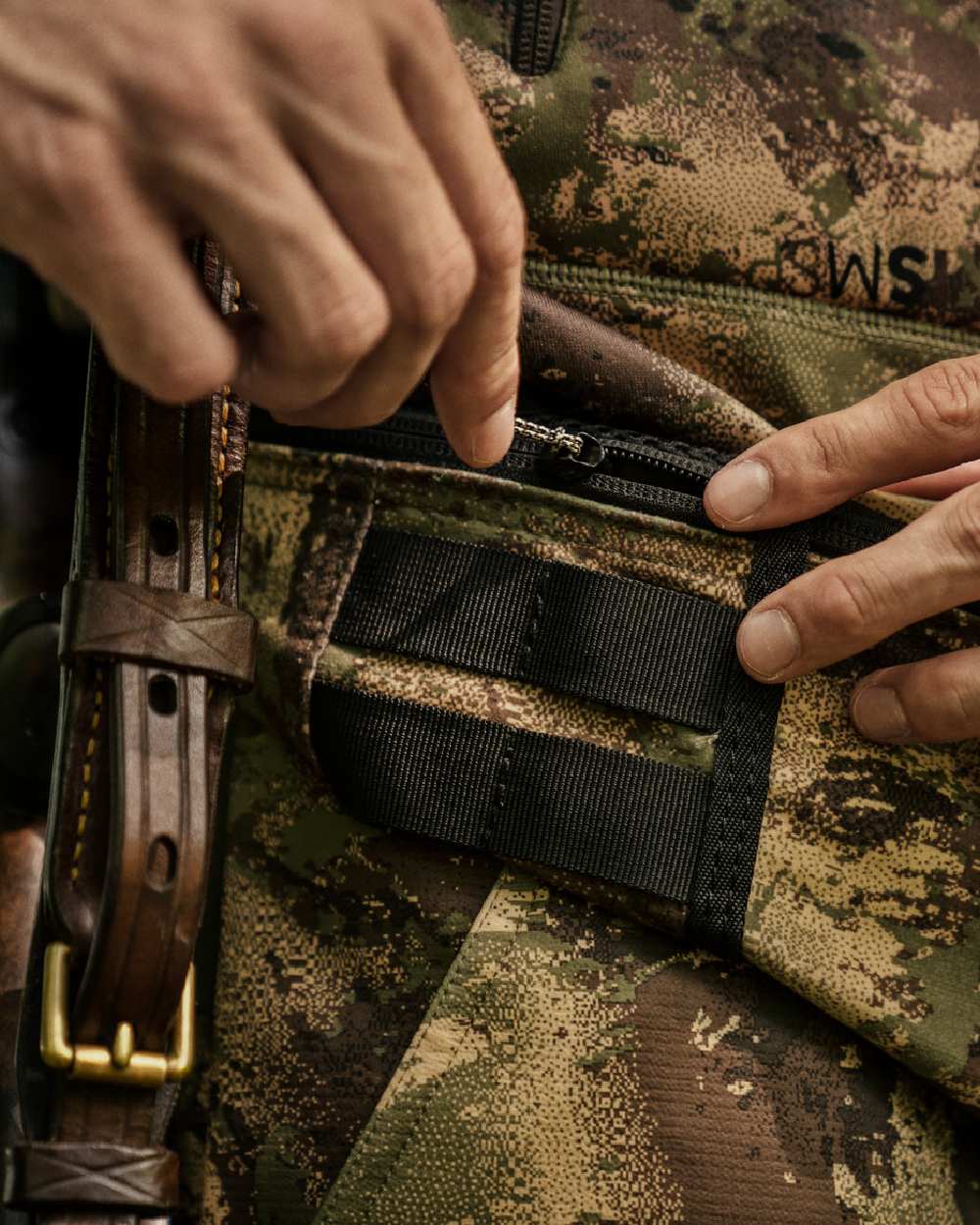 AXIS Forest Coloured Harkila Deer Stalker Waist Pack on outdoor background