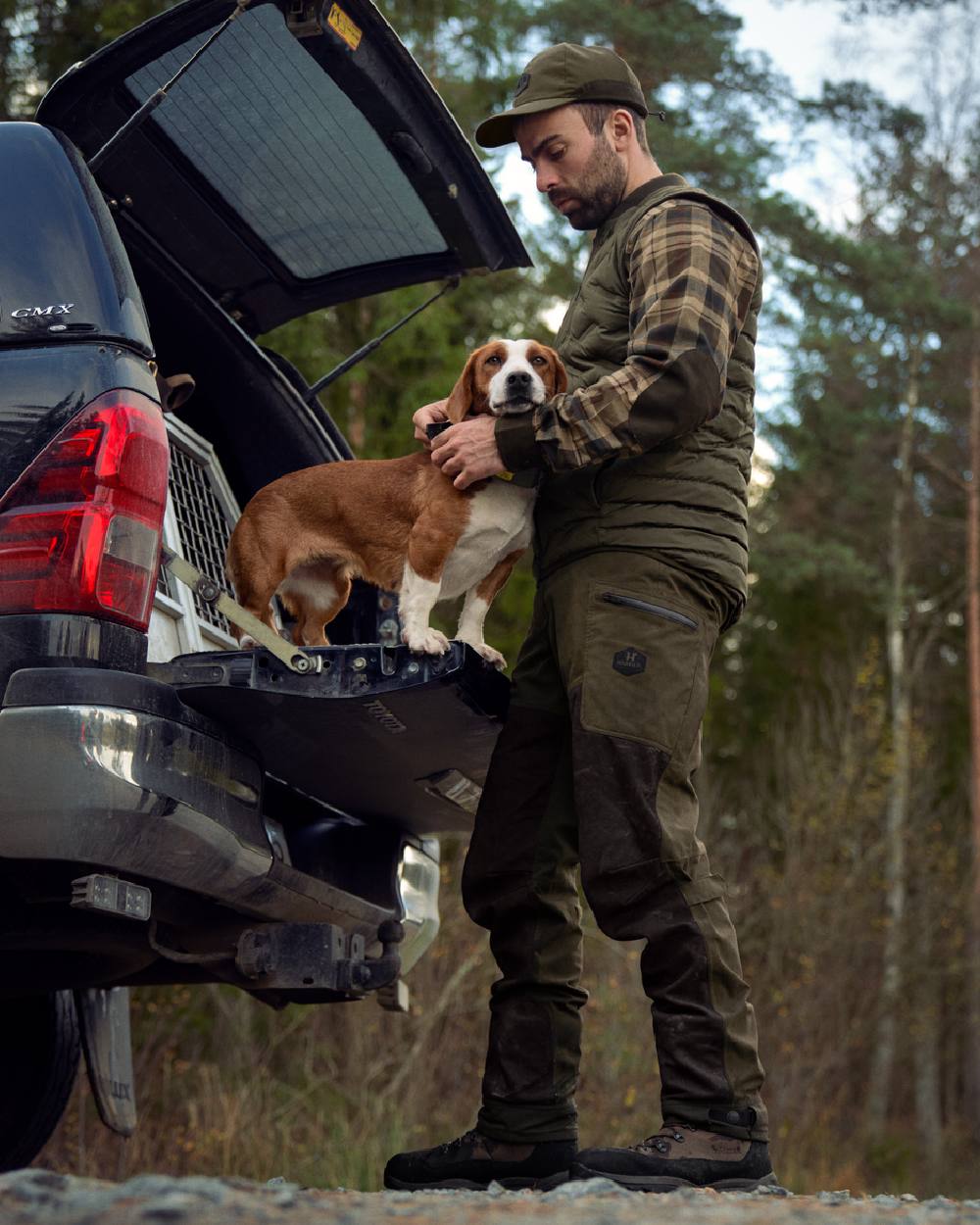 Willow Green Shadow Brown Coloured Harkila Driven Hunt HWS Leather Trousers on forest background