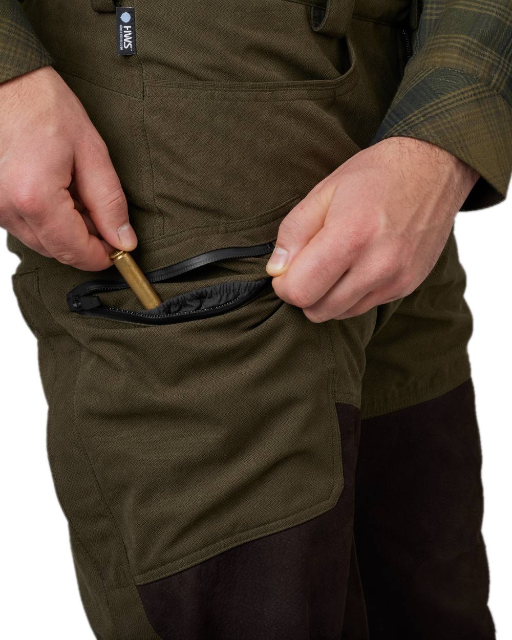 Willow Green Shadow Brown Coloured Harkila Driven Hunt HWS Leather Trousers on white background