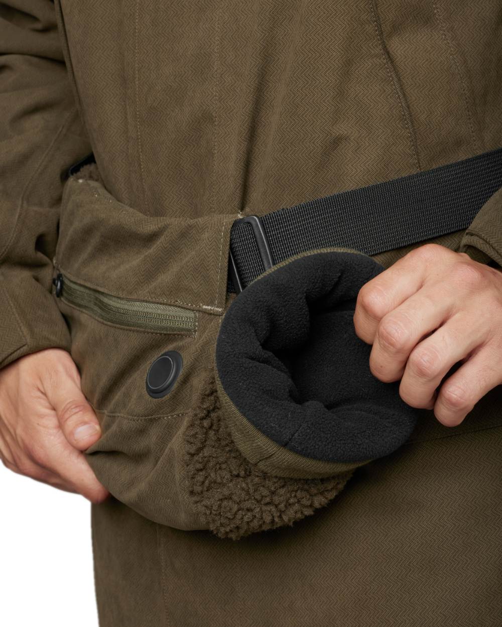 Willow Green Coloured Harkila Driven Hunt Heat Muff on white background