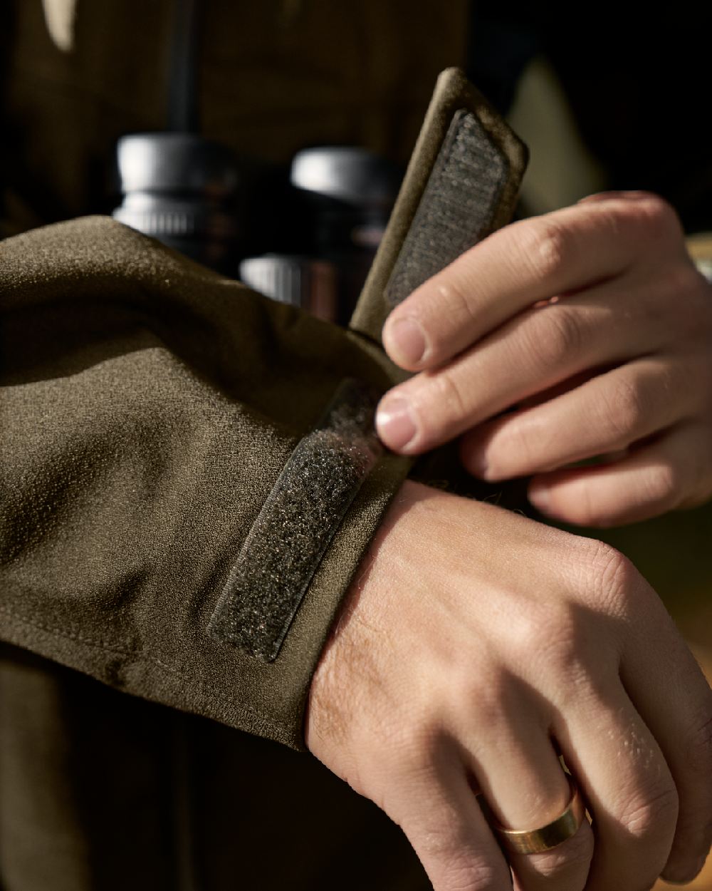 Hunting Green Coloured Harkila Finnmark HWS Jacket on blurry background