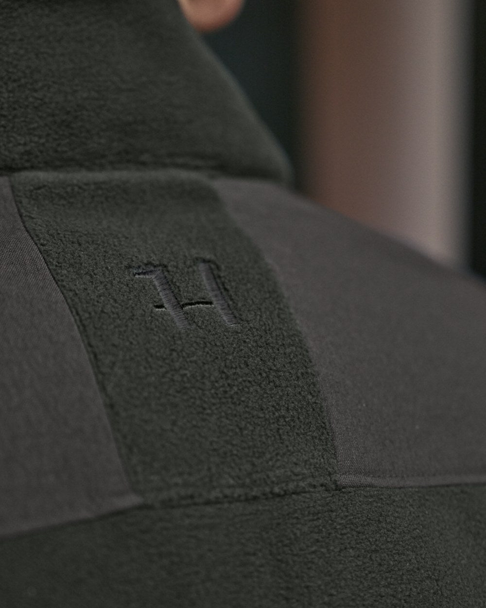 Jet Set Meteorite Coloured Harkila Fjell Fleece Jacket on forest background