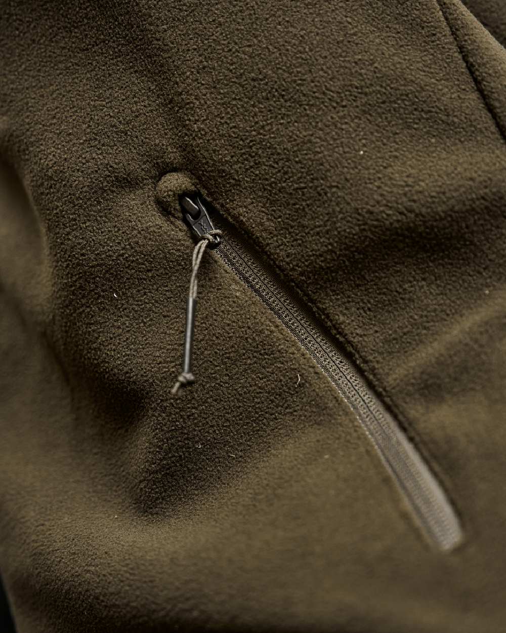 Hunting Green Willow Green Coloured Harkila Fjell Fleece Waistcoat on blurry background