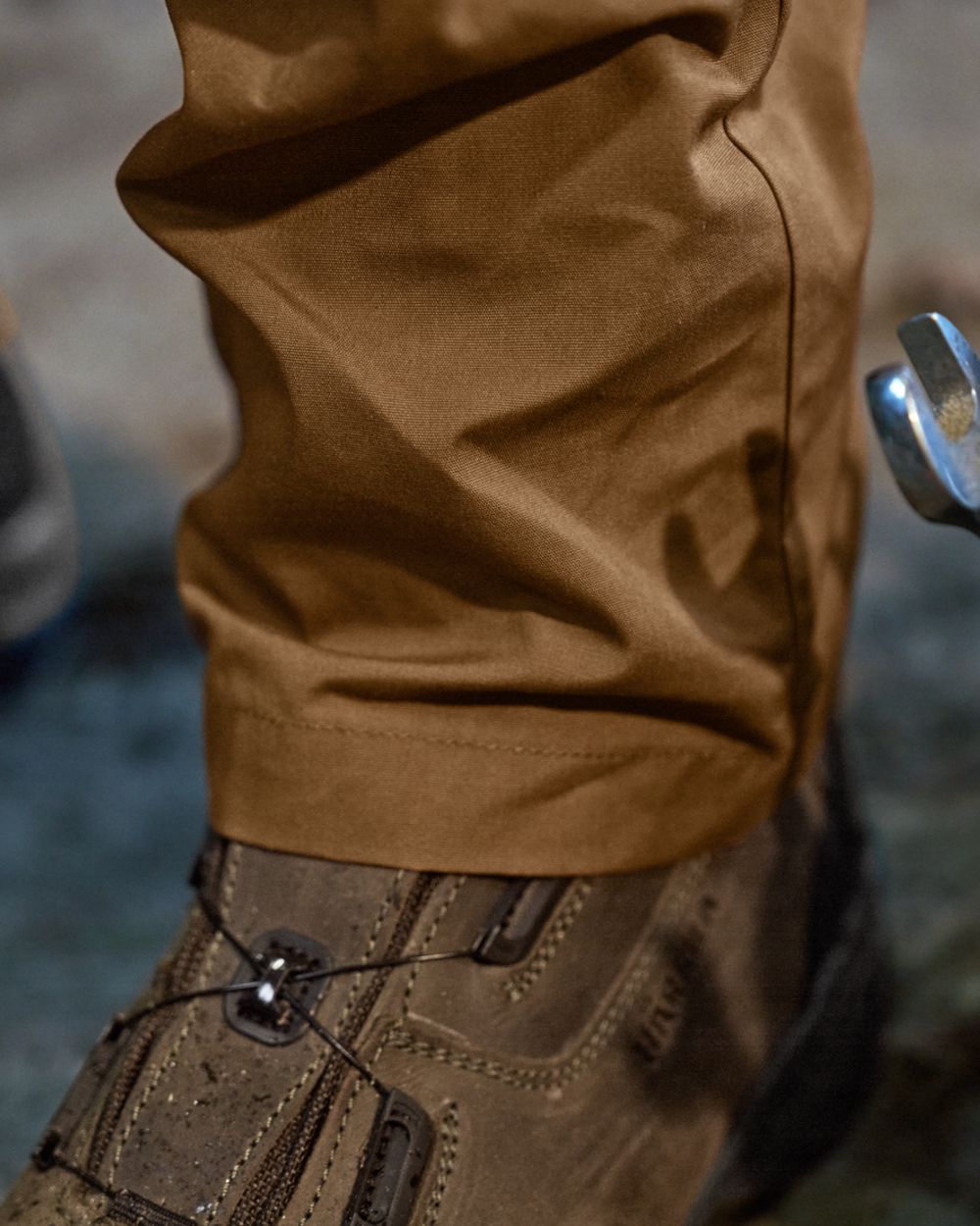Rustique Clay Brown Coloured Harkila Fjell Trousers on factory background