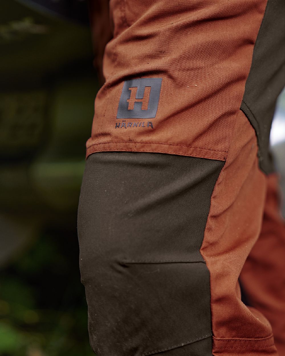 Shadow Brown Arabian Spice Coloured Harkila Fjell Trousers on blurry background