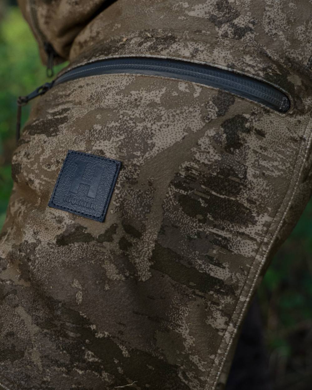 AXIS MSP Darkwood coloured Harkila Forest Hunter GTX Camo Trousers on forest background
