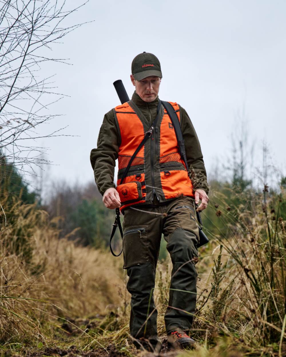 Hunting Green Shadow Brown Coloured Harkila Forest Hunter Pro GTX Trousers on outdoor background