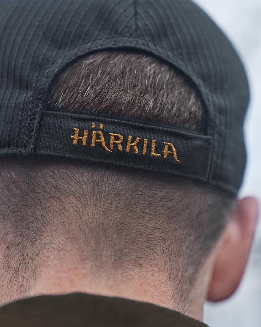 Dark Navy Coloured Harkila Instinct Cap on blurry background