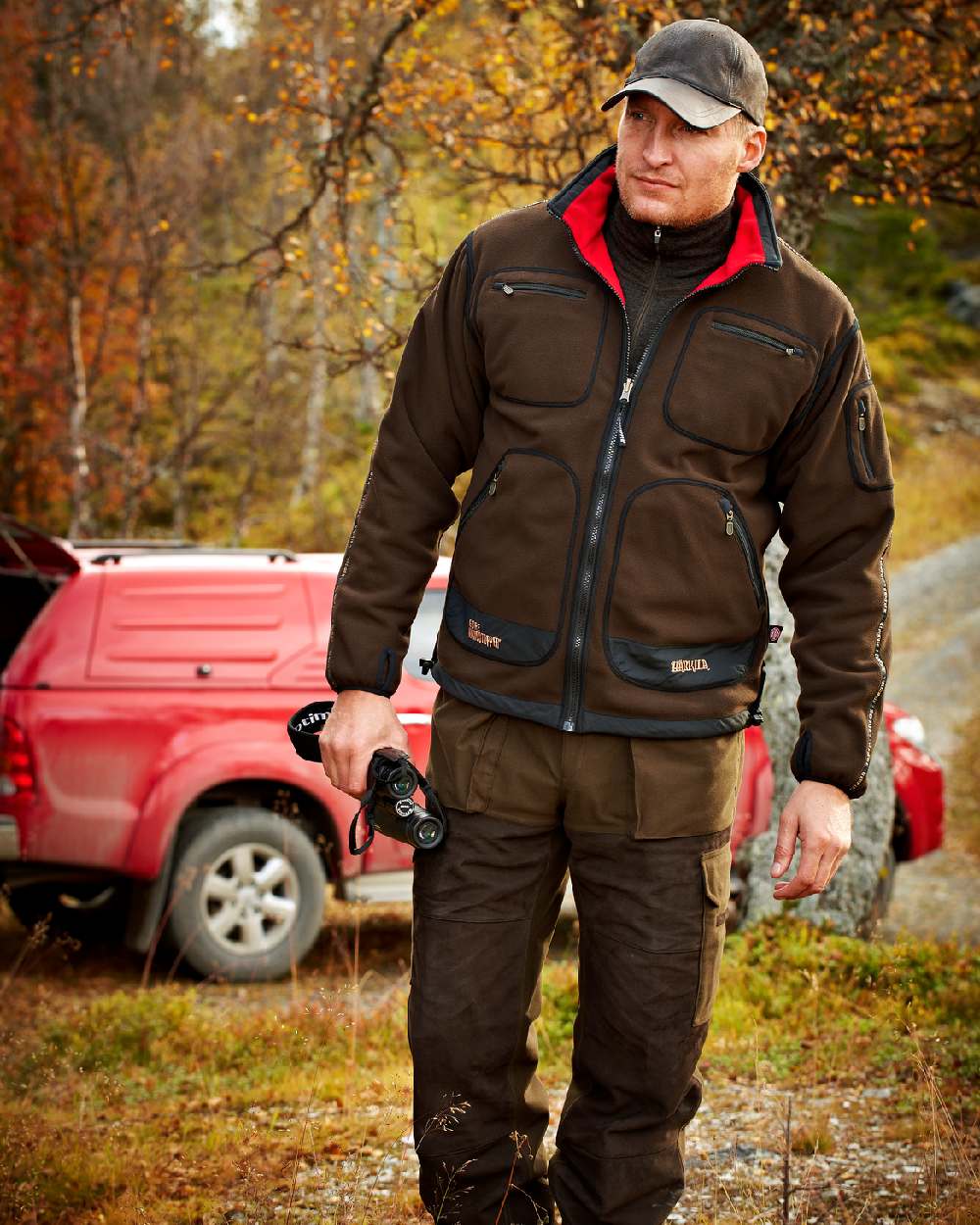 Brown Red Coloured Harkila Kamko Fleece on outdoor background