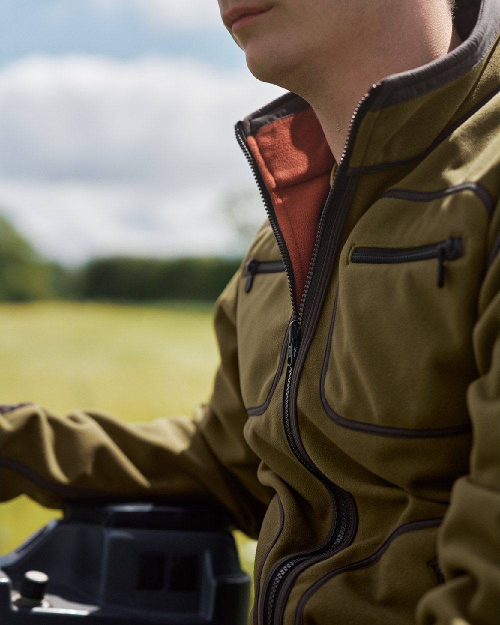 Dark Olive Arabian Spice Coloured Harkila Kamko Fleece on outdoor background