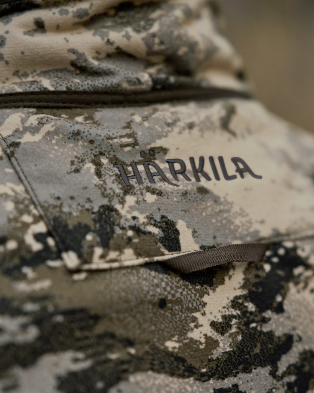 Axis MSP Mountain Shadow Brown Coloured Harkila Kamko Mountain WSP Reversible Fleece Jacket on forest background