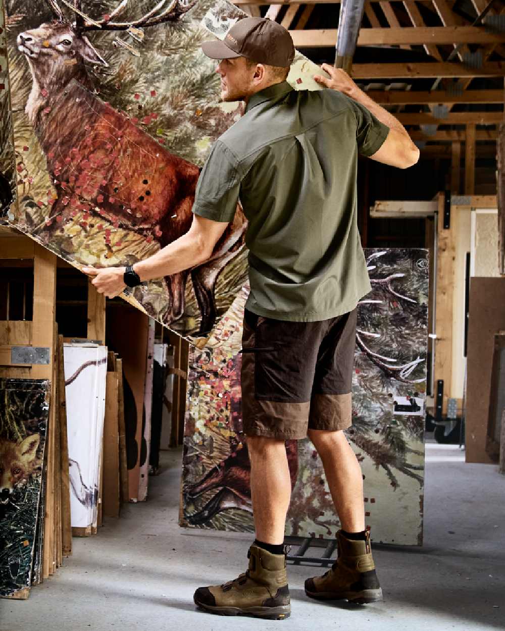 Dark Earth Shadow Brown Coloured Harkila Mens Fjell Shorts on studio background