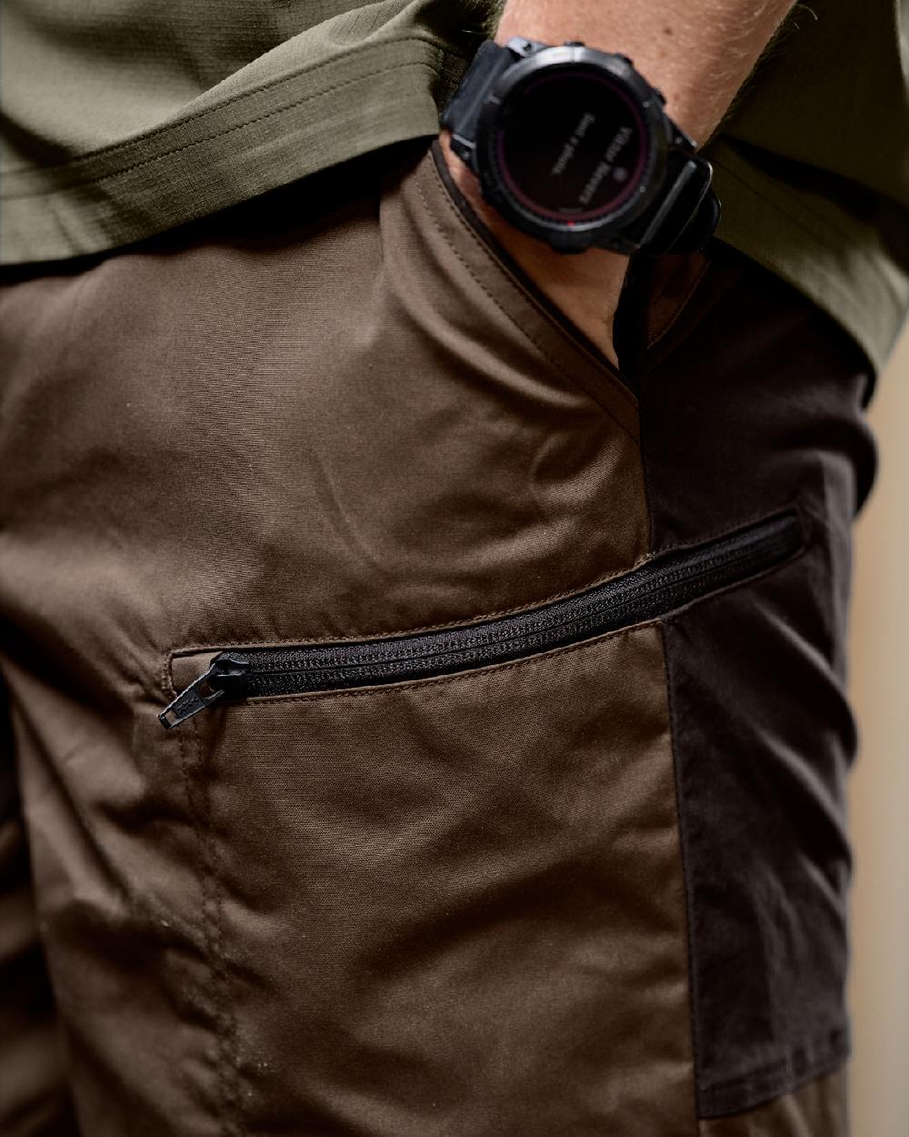 Dark Earth Shadow Brown Coloured Harkila Mens Fjell Shorts on studio background