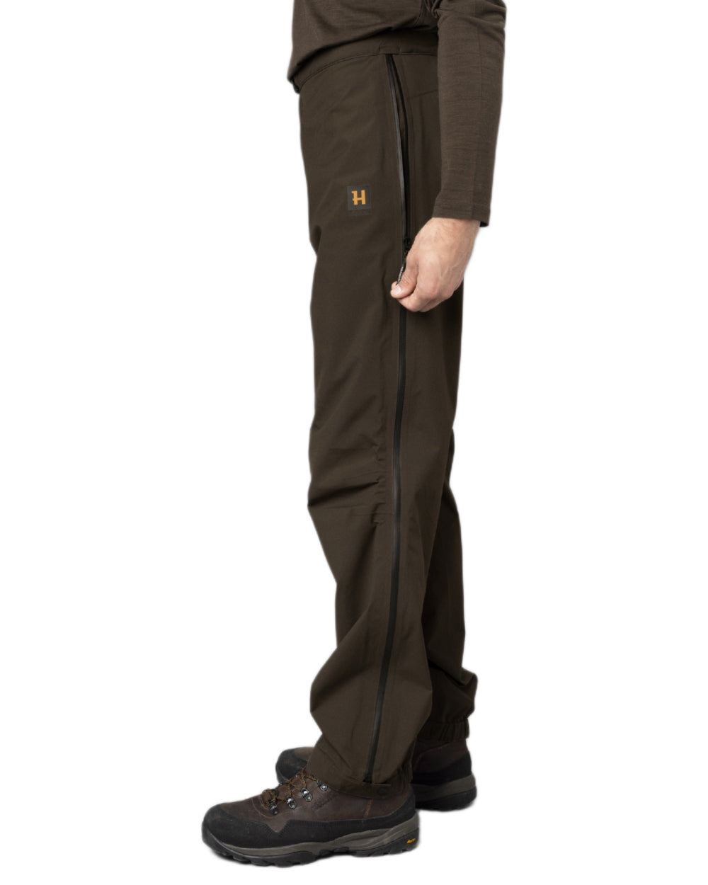Willow Green coloured Harkila Mens Logmar HWS Packable Trousers on white background