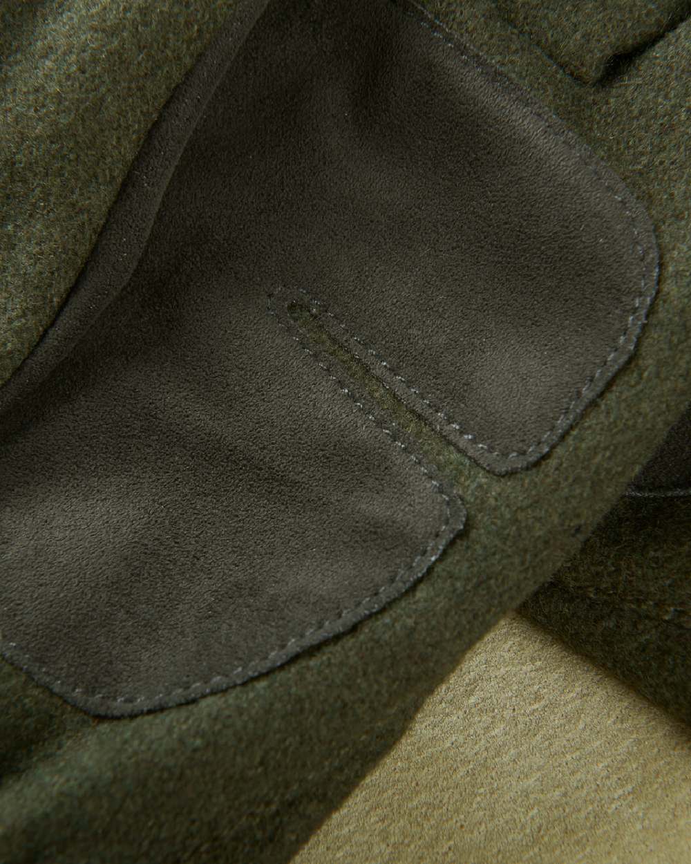 Willow Green Coloured Harkila Metso Active Gloves on blurry background