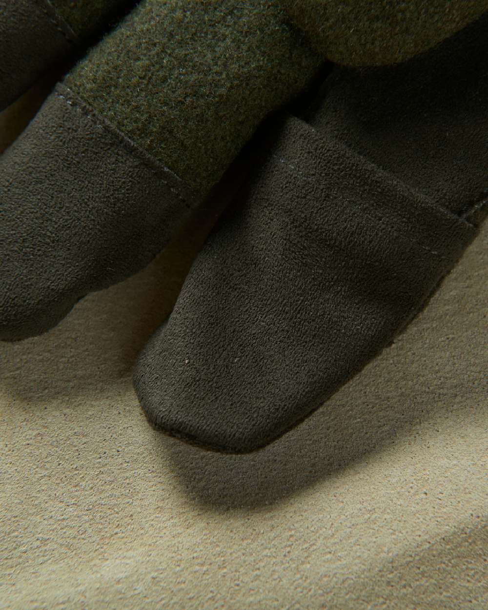 Willow Green Coloured Harkila Metso Active Gloves on blurry background