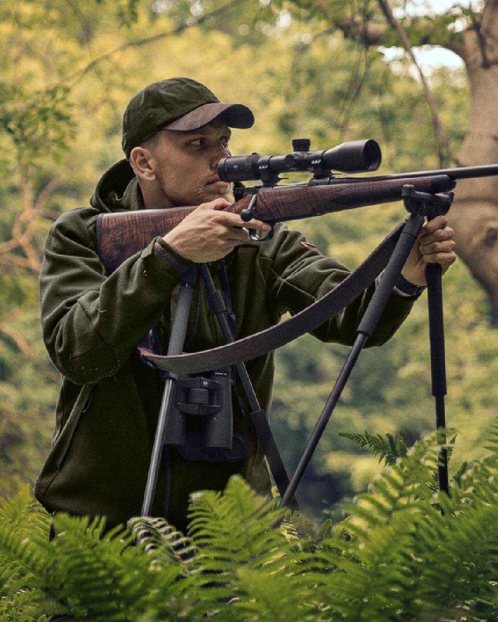 Willow Green Coloured Harkila Metso Hybrid Jacket on forest background