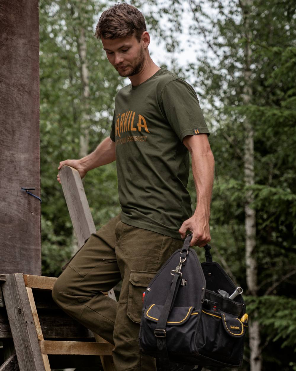 Rosin Coloured Harkila Modi Short Sleeve T-Shirt on forest background